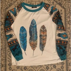 Very nice western west tee shirt. Long sleeves women sz. XL. Made by COWGIRL.